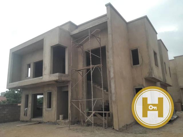 Two-storey residence — plastering complete